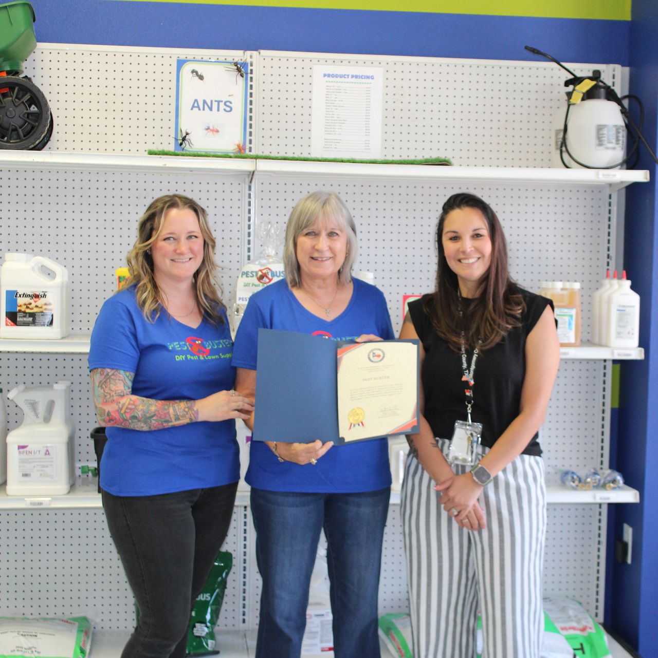 Conroe Lake Conroe Chamber of Commerce membership certificate presented to Pest Buster DIY store in Montgomery TX